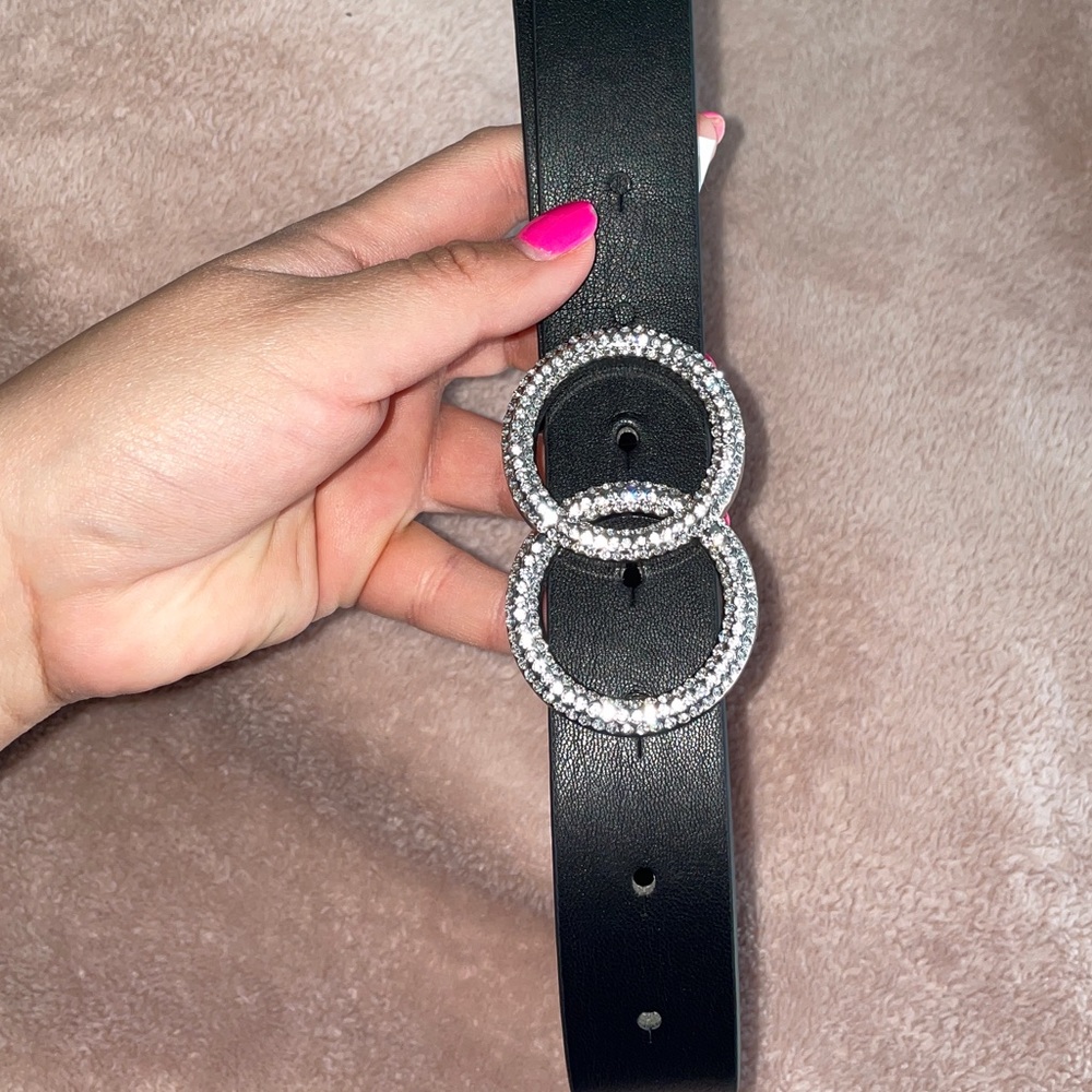 Brand-new express belt with jewels. Only worn once amazing condition.